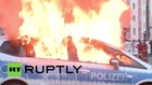 Germany: Militants set police car AFLAME in ECB protest