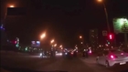 Car Runs A Red Light Hitting Two Pedestrians