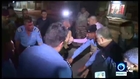 Watch as policemen try to dismantle a young boy's explosive belt in Iraq’s Kirkuk