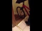 Man Rides Bike Down Stairs