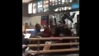 Pissed off employee at a fast food restaurant starts throwing punches at the manager
