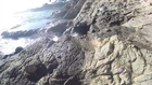 Guy Climbs Up Wall and Jump Into Inlet