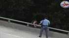 North Carolina Police Officer talks man off Bridge, gives him a Hug