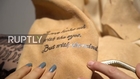 UK: McQueen's 'Human skin' handbags put on display at university fashion show
