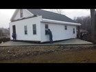 80 Amish people pick up house and move it