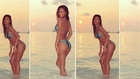 Sexy Nicole Scherzinger trades bikini for charity shoot