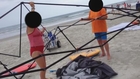 Women caught on video stealing beach equipment from Florida family