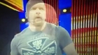 Sting attacks Triple H with a baseball bat
