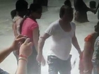 Couple enjoying Fresh bath in Puri sea beach